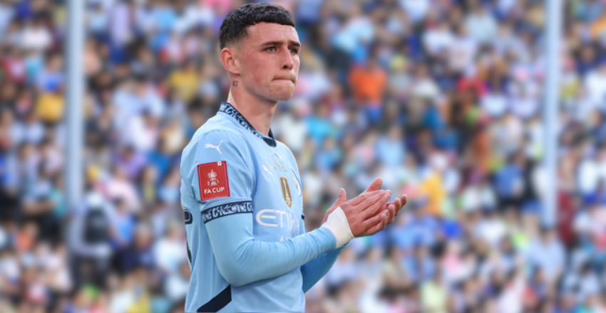 Phil Foden celebrating during a competitive football match
