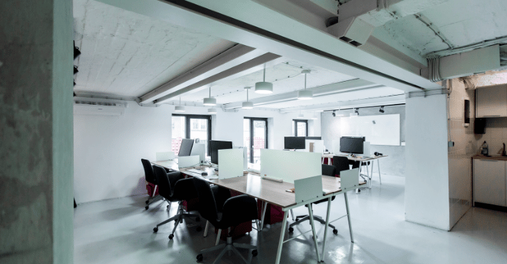 Business team reviewing office rental options and lease terms