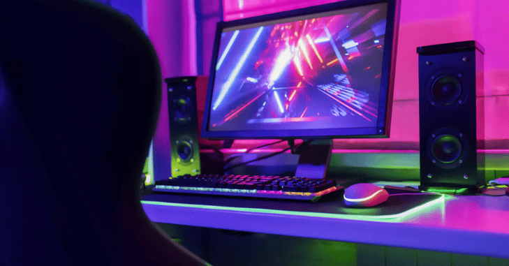 Content creator editing 4K footage on a high refresh rate monitor